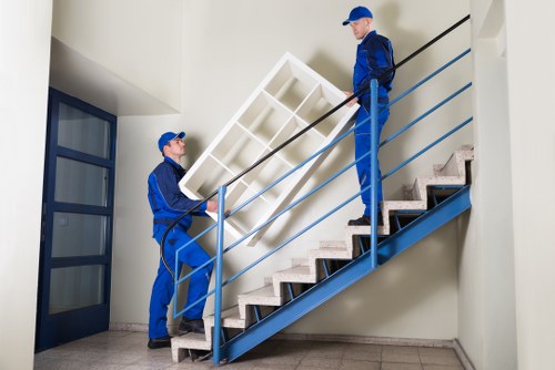 Local movers handling a relocation in Soho streets