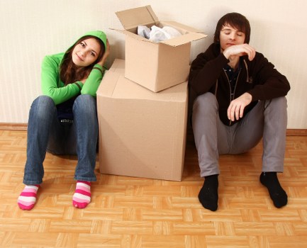 Packing and loading preparation for a Soho move with boxed items and furniture