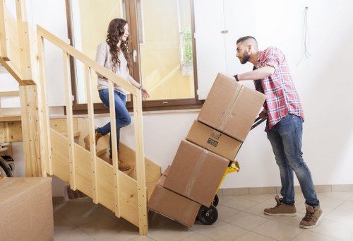 Van loading during a house move near Soho apartment buildings