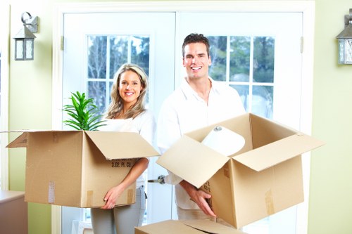 Carefully packed fragile items for a home move in Soho